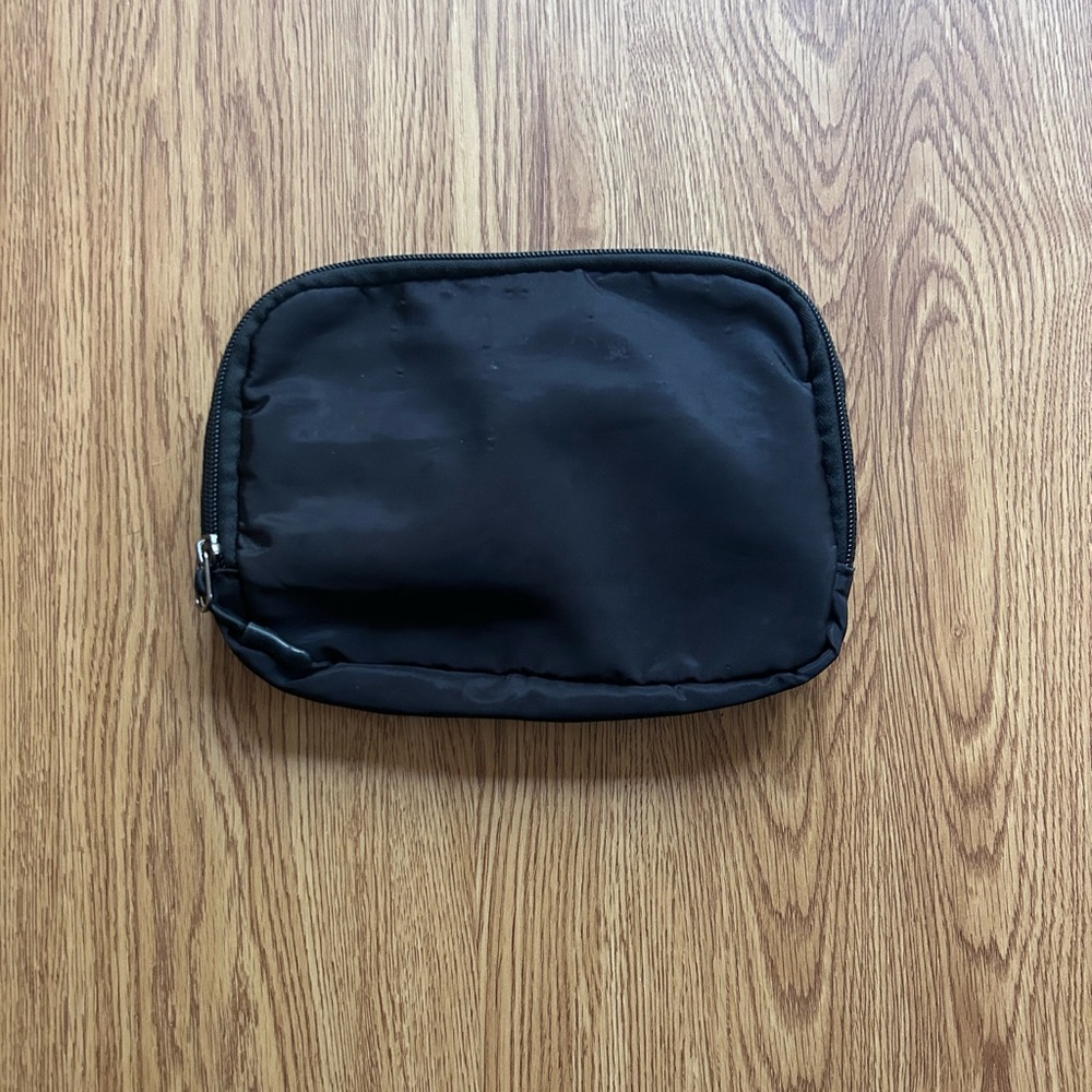 Sleek Black Women's Travel Pouch